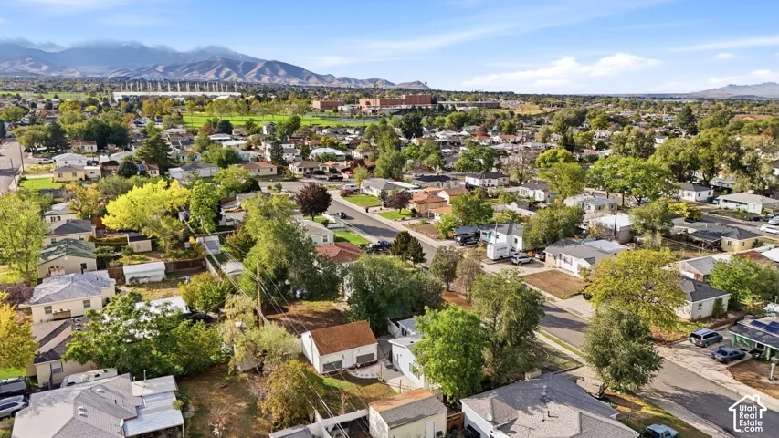 Open green space and mountain views sit just beyond the neighborhood, with recreation close by.