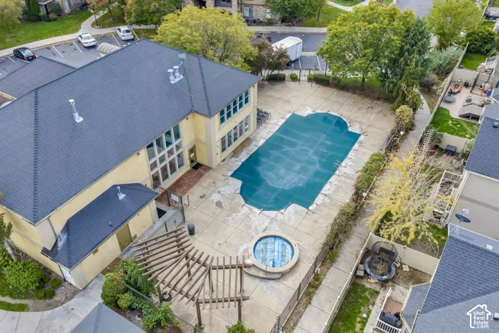 Hot tub, pool, and clubhouse exterior