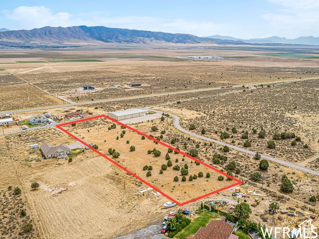 Expansive rural acreage featuring native vegetation and a mountain backdrop