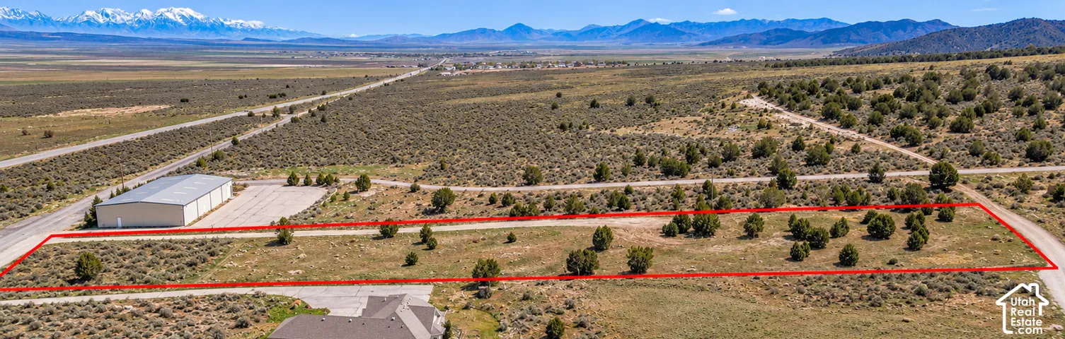 RV and Vehicles are no longer on the property so they were removed with AI just to show the raw land .