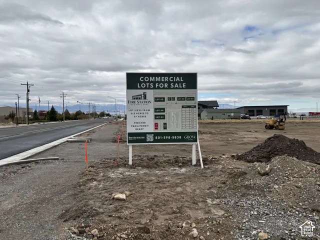Level commercial land with finished pads and paved street access