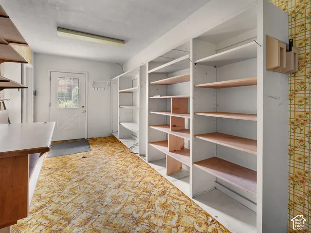 Spacious laundry/mudroom connected to garage