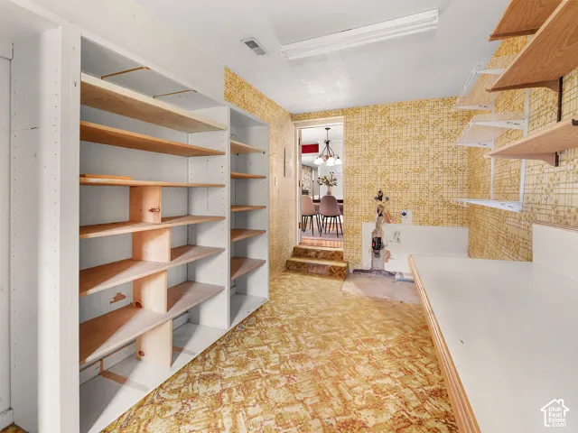 Built-in floor-to-ceiling shelving