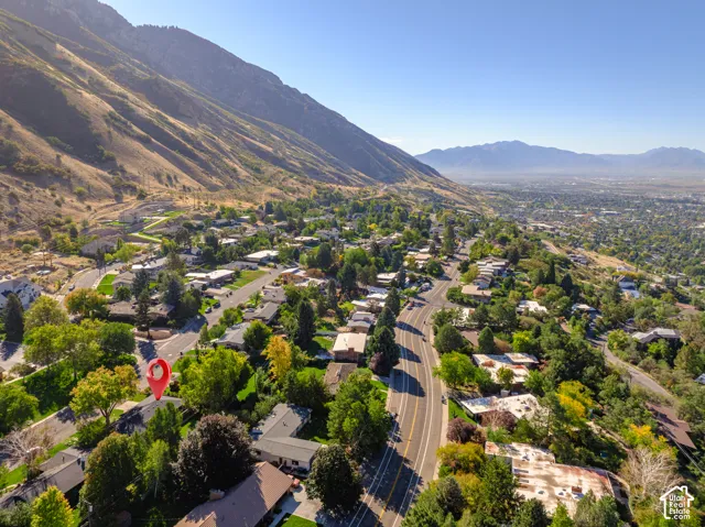 Aerial perspective showing the  prominent mountain backdrop