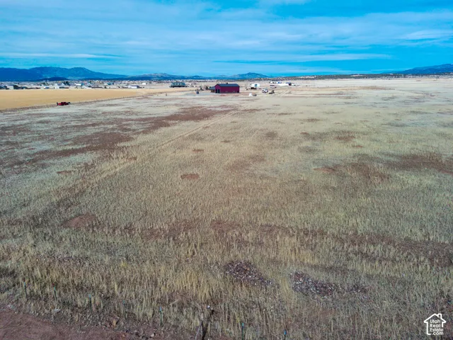 Expansive acreage featuring natural terrain and a prominent mountain backdrop