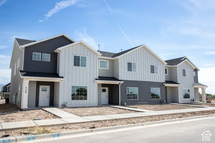 Front of the townhome (landscaping is included and will be installed).