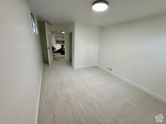 Basement level bedroom 2 with new fresh carpet.