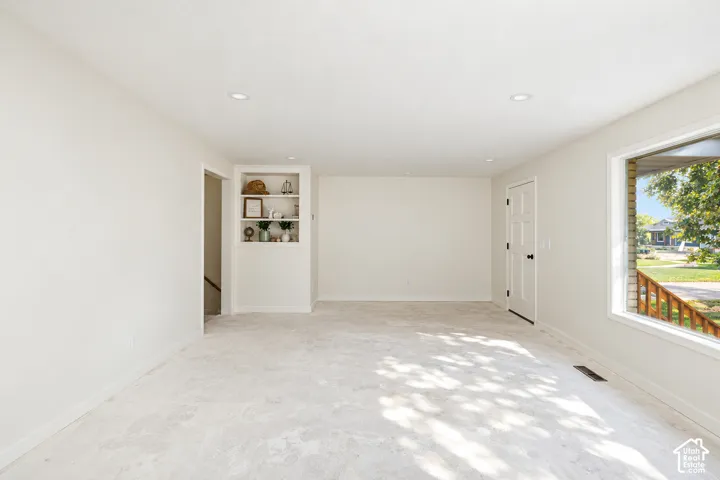 LIVING ROOM 2 WITH LVP FLOORING  STILL BEING INSTALLED