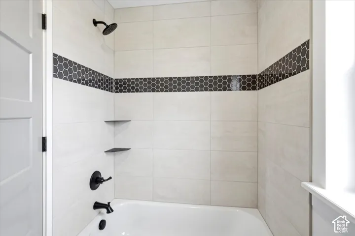 Shower and tub surround in Jack and Jill Bathroom