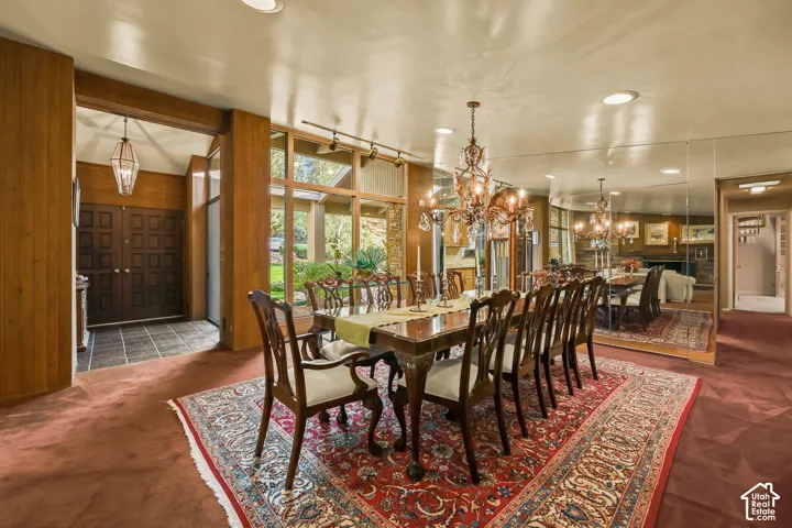 Large formal dining area with Floor to Ceiling windows.