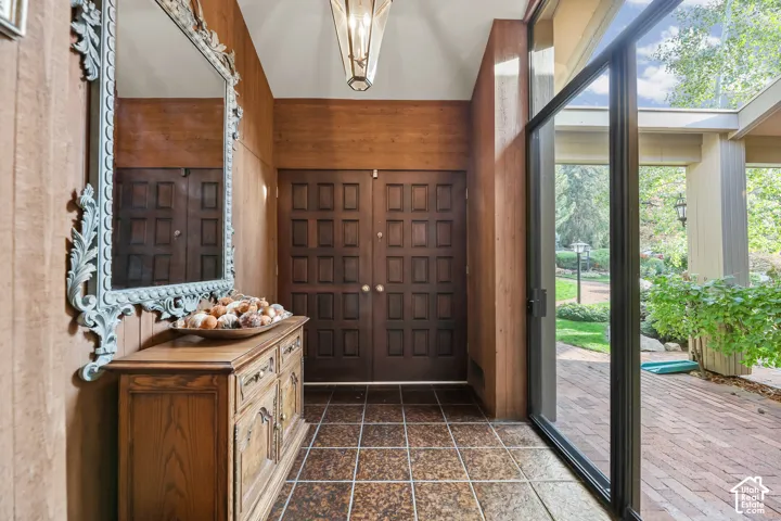 Formal Main entry with floor to ceiling glass.