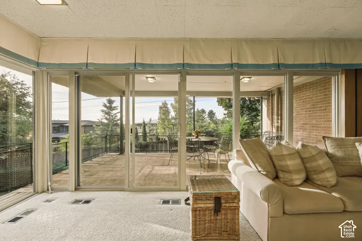 Sliding glass doors to outside deck.
