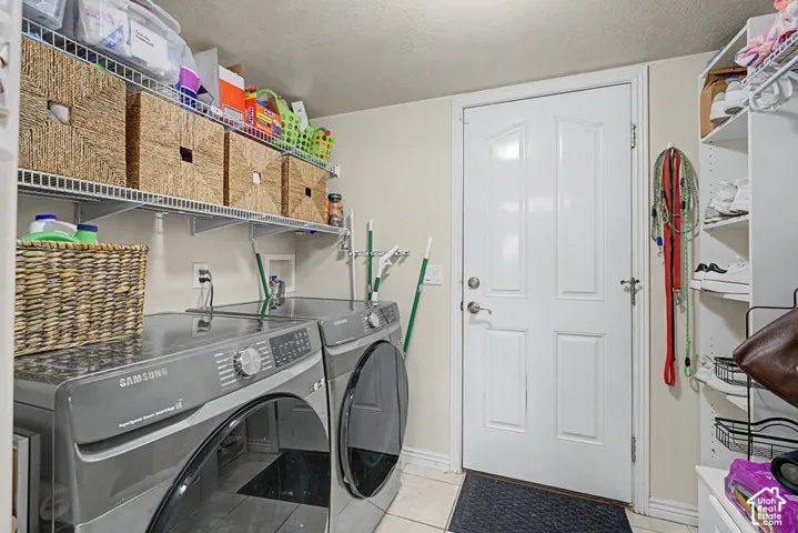Extensive wire shelving, durable tile flooring, and a paneled white door