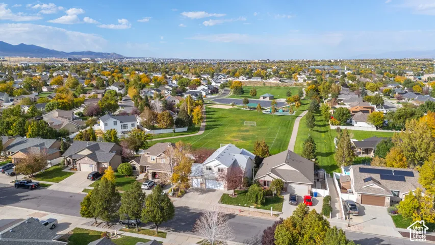 Neighborhood setting with a community park and manicured green spaces