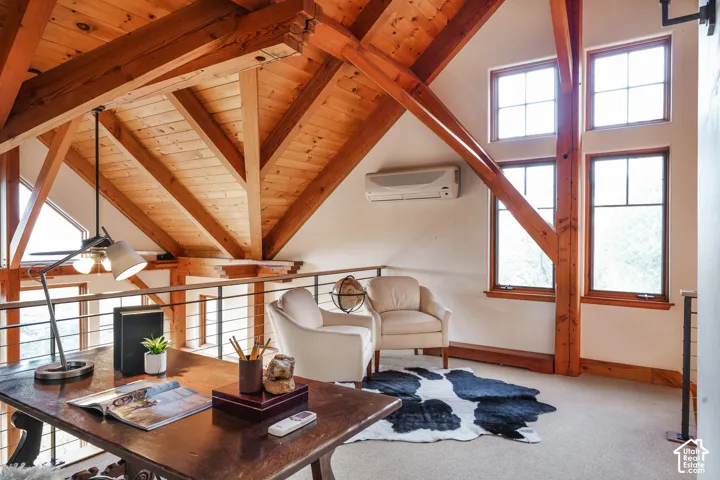 Exposed timber-frame vaulted ceilings, integrated steel railing system, energy-efficient mini-split climate control, and multi-pane windows with wood trim