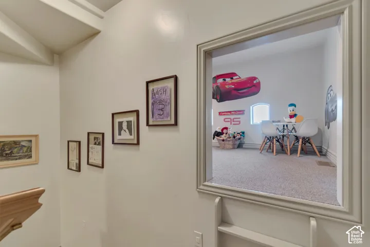 Entrance to hidden Playroom off staircase going to basement