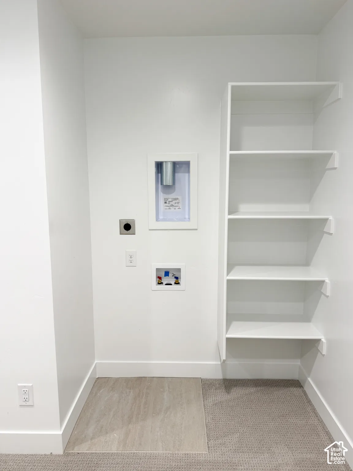 Laundry in master closet