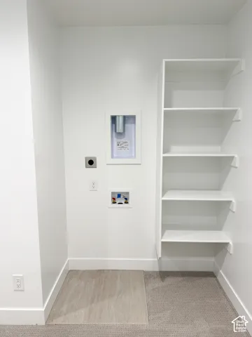Laundry in master closet