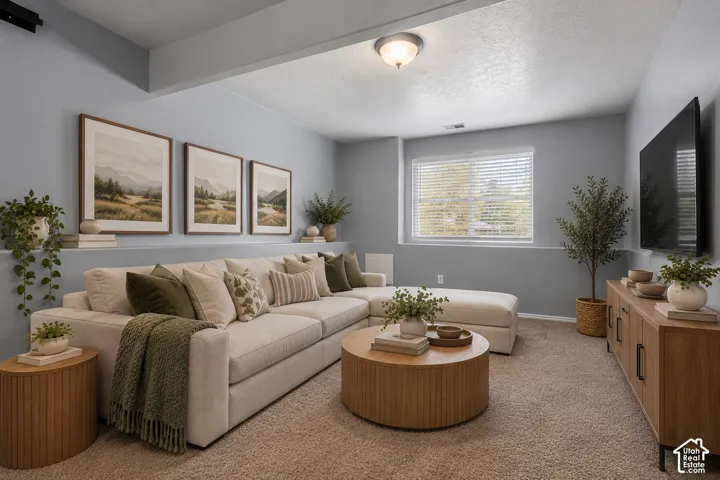 Neutral wall tones, carpeted flooring, built-in recessed wall ledge, and horizontal window blinds