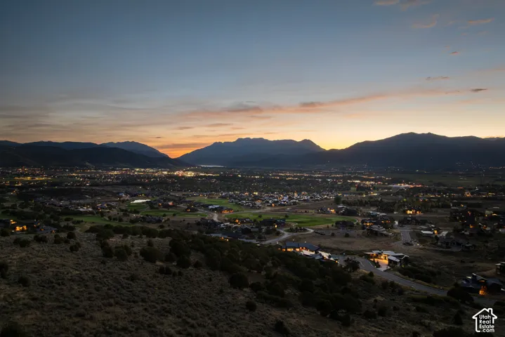 Panoramic mountain backdrop featuring extensive valley scenery and natural high-desert topography
