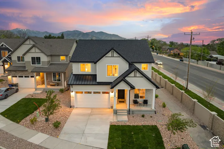 Two-story exterior featuring a mixed material fa