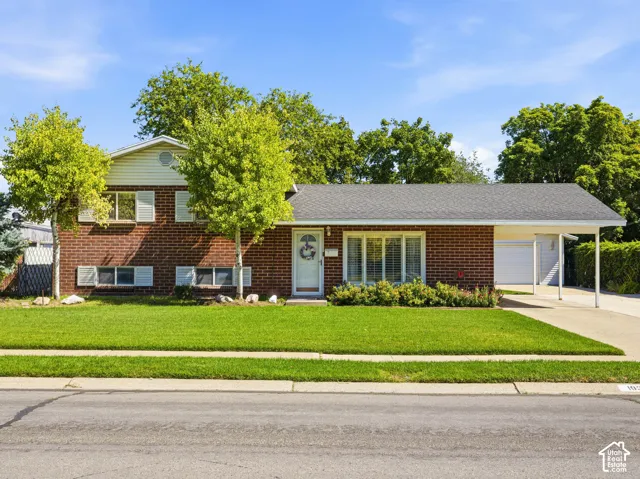 Brick exterior with white siding accents