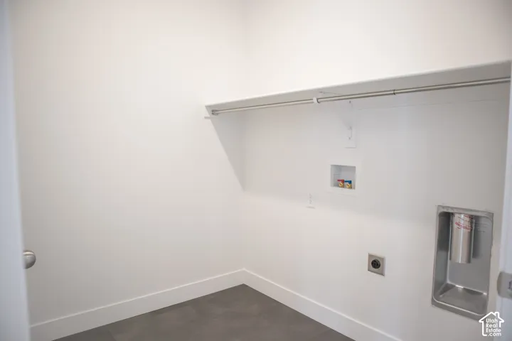 Full-size, dedicated laundry room with washer/dryer hookups.