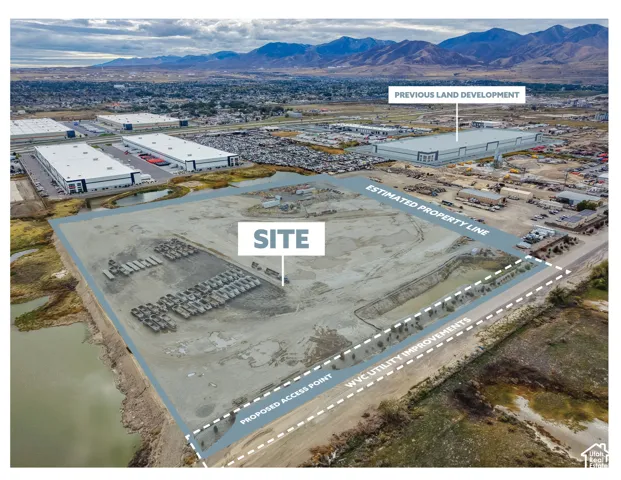 Expansive development site featuring mountain surroundings, designated access point, and utility improvements
