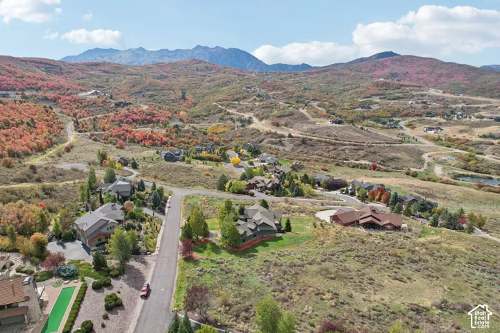 Rolling mountainous terrain with established residential properties