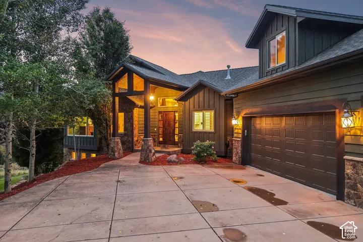 Stone-accented exterior with dark siding