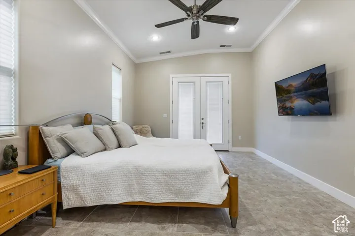Vaulted ceilings with recessed lighting, double glass-panel doors, ceramic tile flooring, and ceiling fan