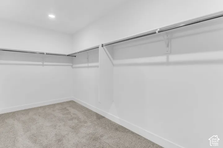 Huge walk-in closet as part of primary suite.