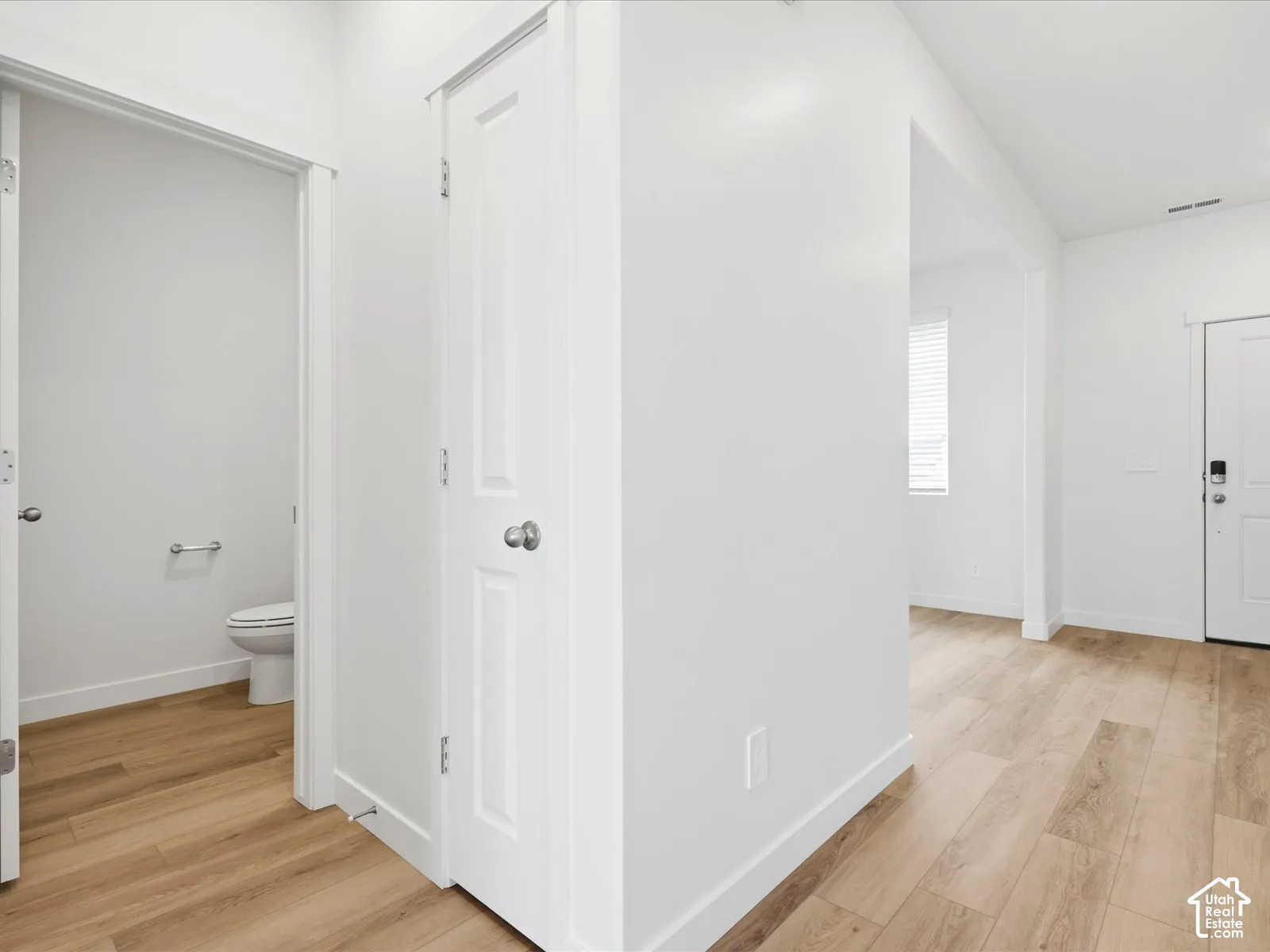 **DISCLAIMER** Interior package may vary. Wood-finish flooring, white panel doors, neutral wall palette, and white interior trim