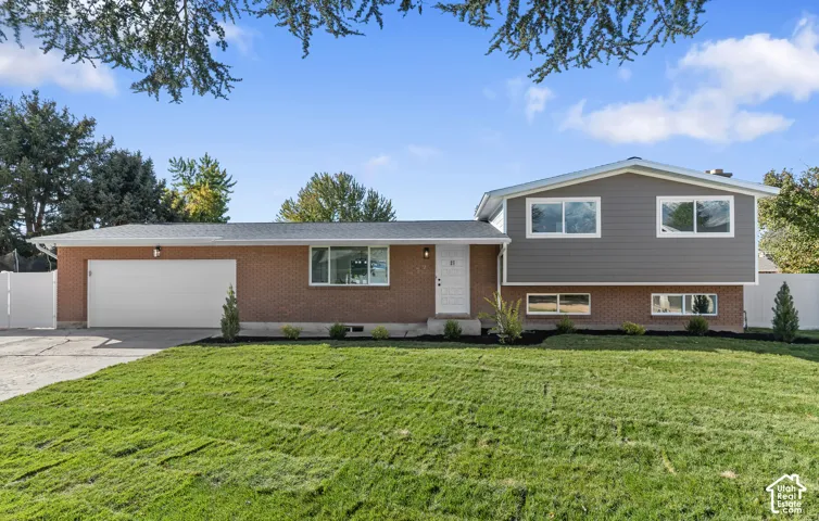 ALL New Exterior Featuring New Roof, Fiber-Cement Siding, Gutters, Windows & ALL New SOD And Landscaping!