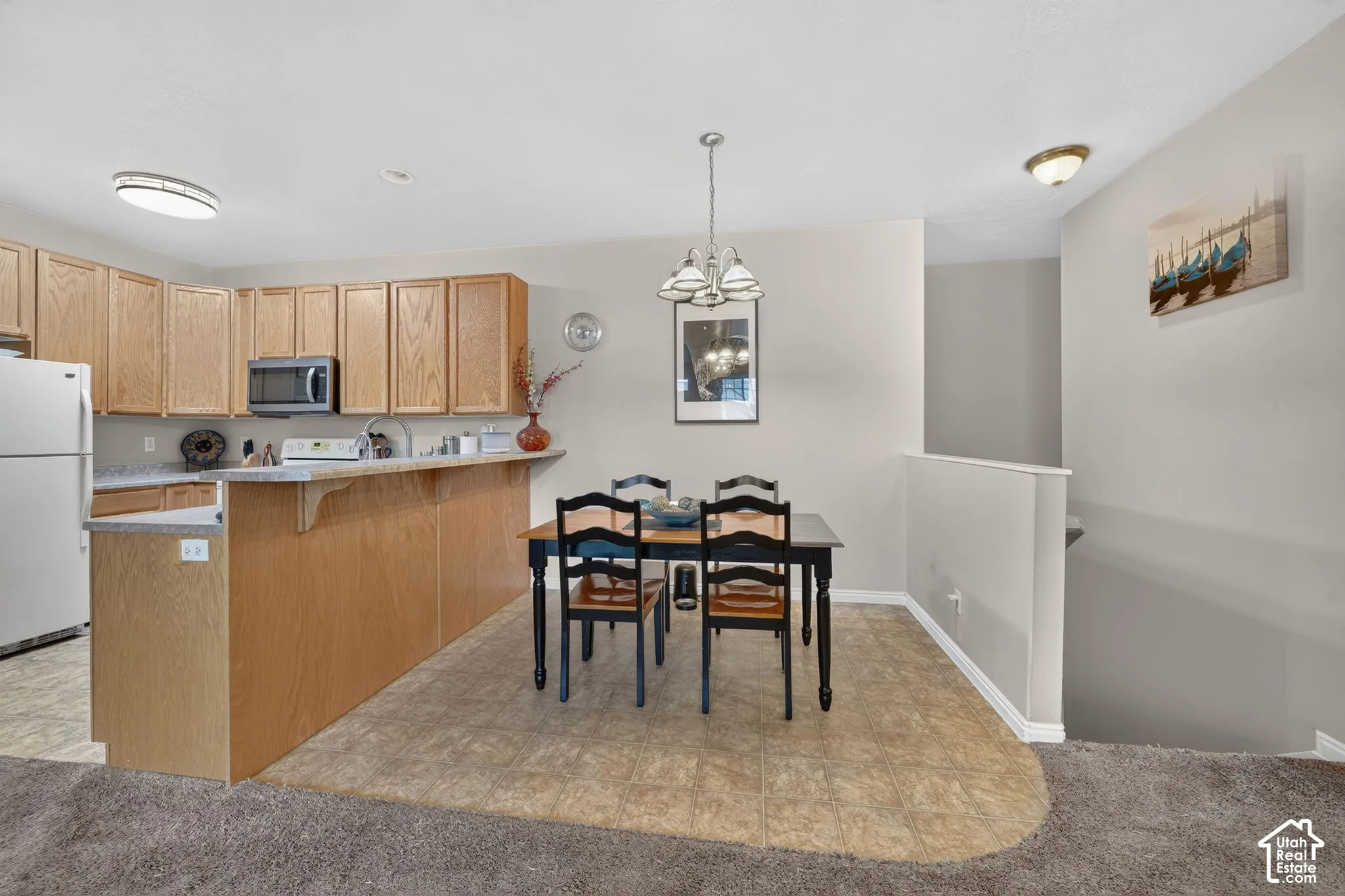 Dining space beside the kitchen breakfast bar.