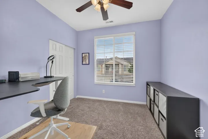 Second bedroom, currently arranged as a home office.