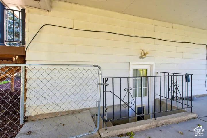 door to lower unit from carport.