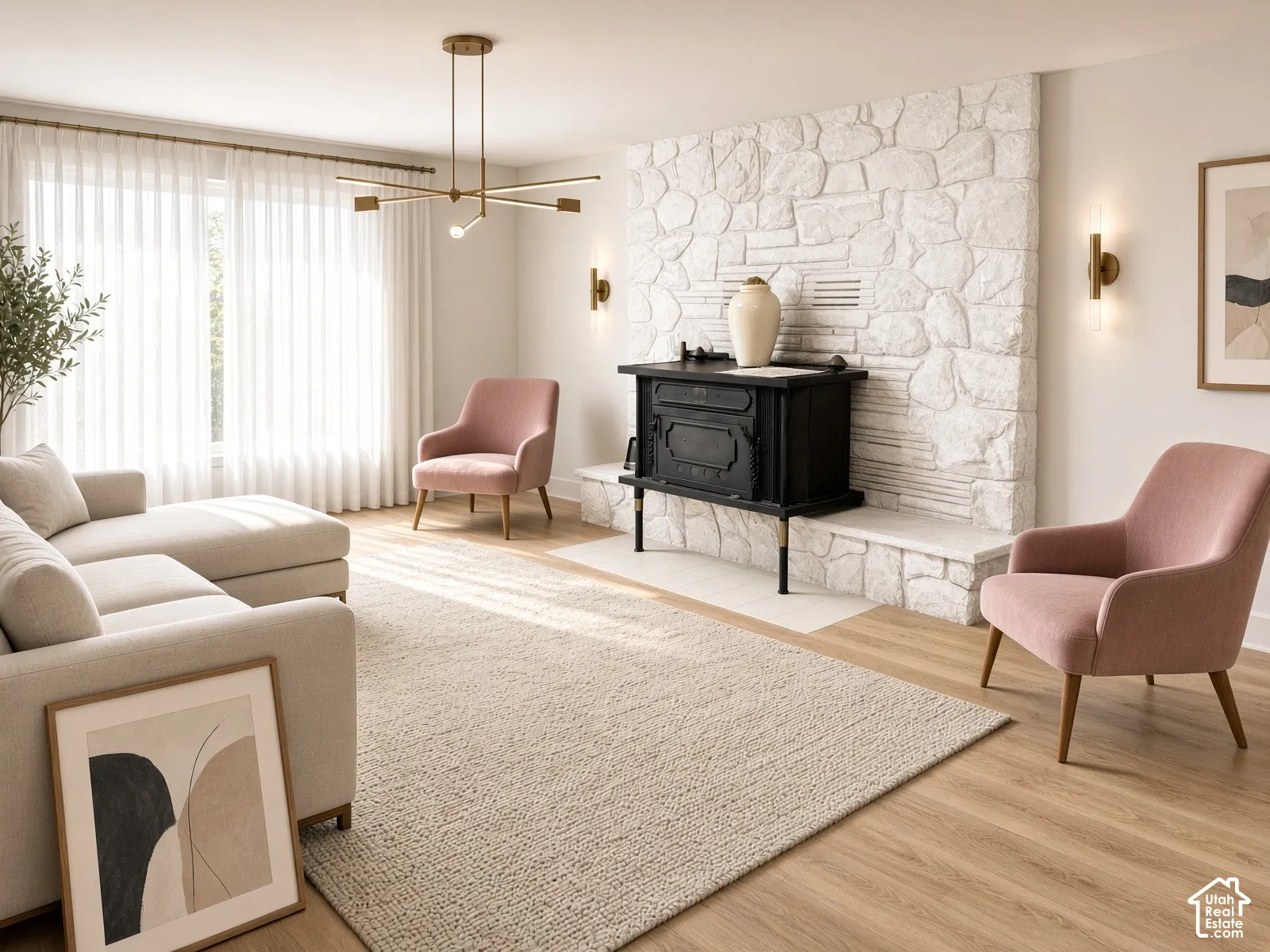 Living area featuring a floor-to-ceiling painted stone fireplace, wood-finish flooring, a matte black cast-iron wood stove, a multi-arm geometric chandelier, and dual wall-mounted sconces