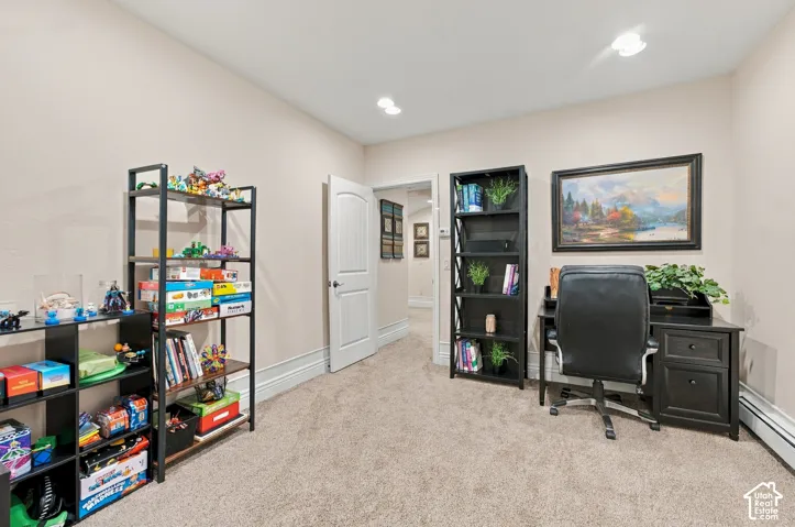 Neutral wall tones, wall-to-wall carpeting, recessed ceiling lighting, and a six-panel arched interior door.