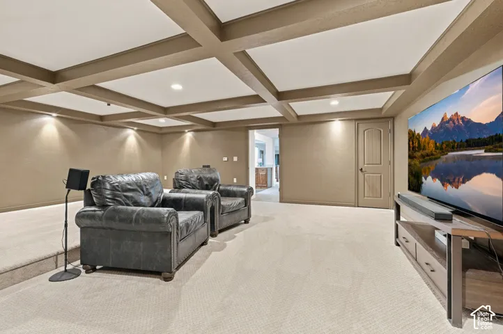 Coffered ceiling with recessed lighting, wall-to-wall brand new carpeting, and a raised platform floor. Wired for projector and speakers.