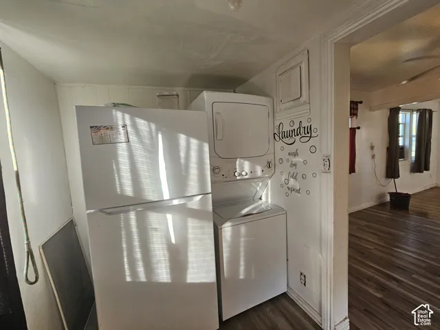 Stackable washer and dryer unit with wood-finish flooring