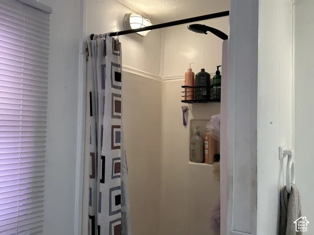 Shower and tub in owner suite bathroom