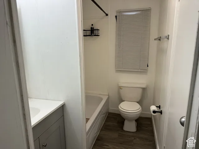 Shared bathroom with a bedroom access door.