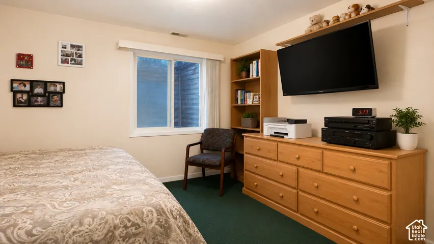 Sliding window with white trim, wall-mounted display shelf, and neutral wall paint