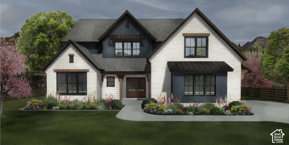 Two-story exterior featuring white brick masonry, dark vertical siding, multi-gabled rooflines with dark metal awnings, and wood-finish architectural accents