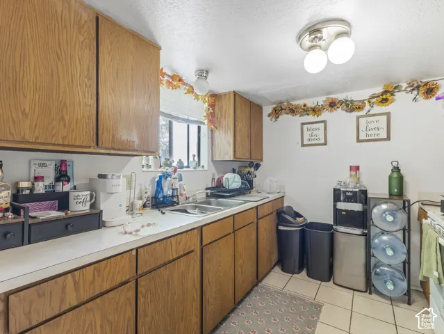 Unit B-Kitchen with original wood cabinets