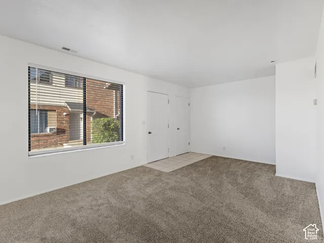 Unit A-New carpet and paint throughout.