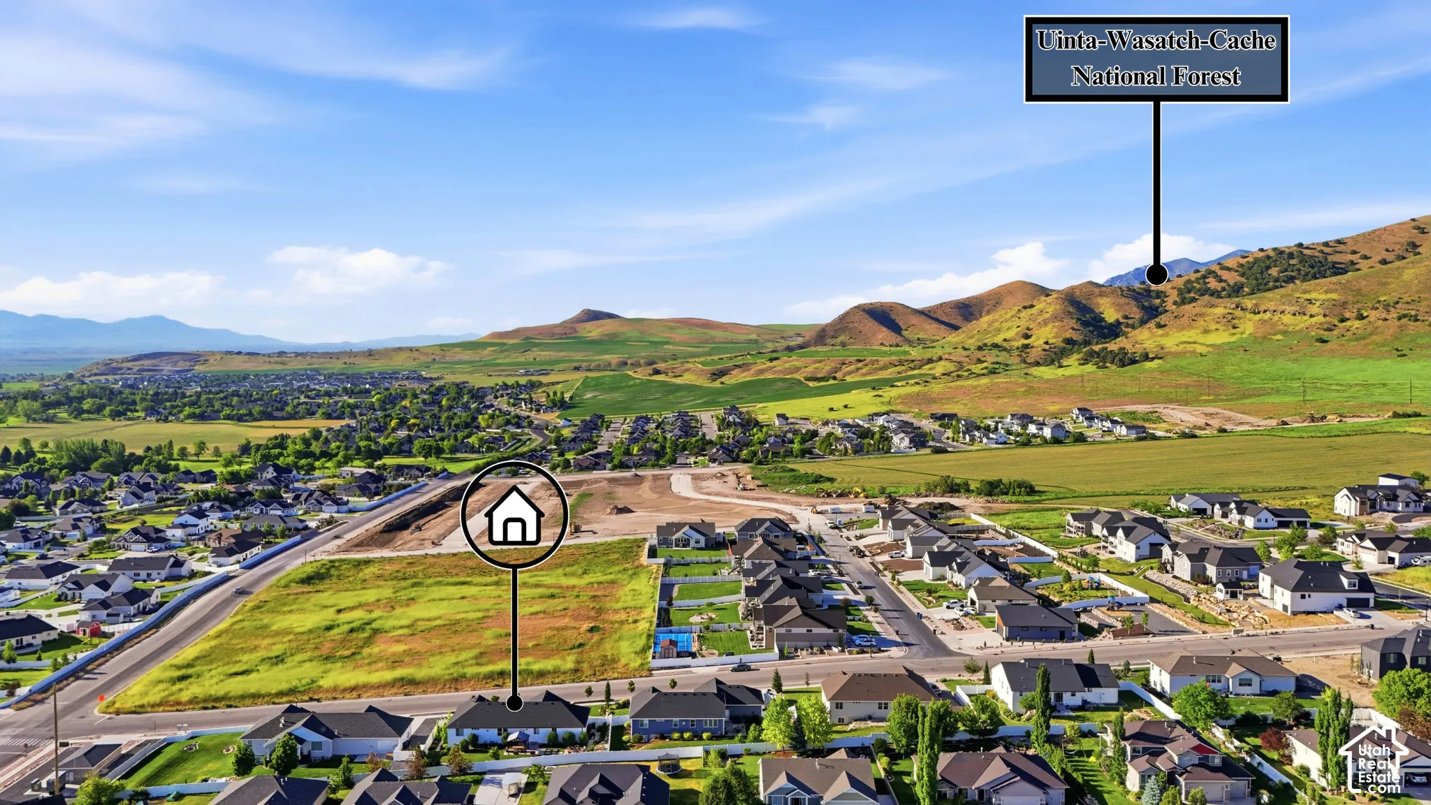 Aerial perspective featuring proximity to the Uinta-Wasatch-Cache National Forest and expansive mountain terrain