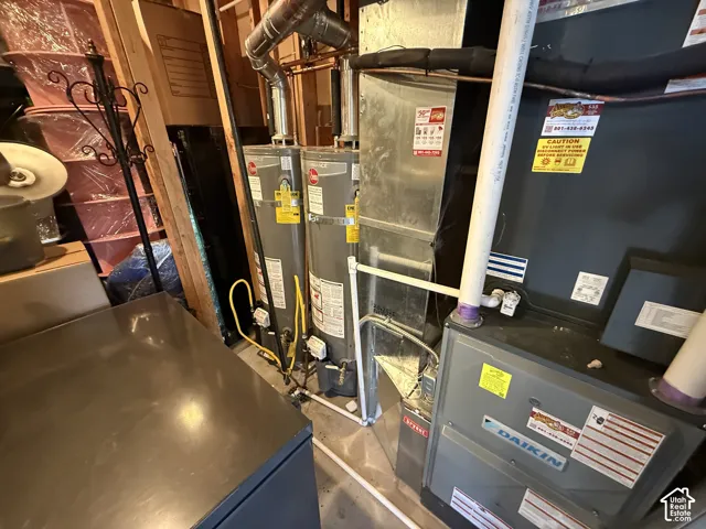 Dual water heater system featuring metallic plumbing and duel Diakon gas-powered heating units