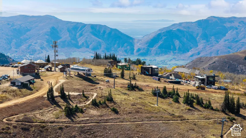 Mountainous terrain featuring panoramic ridge elevations, high-altitude alpine vegetation, and rugged landscape topography